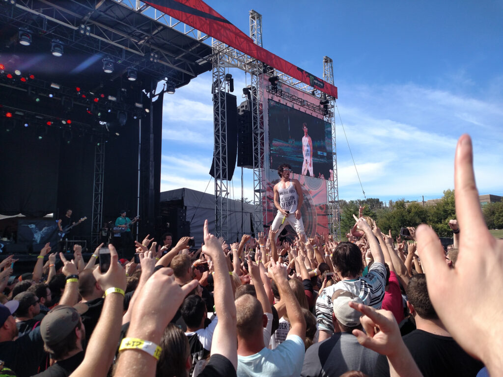 Jesse Hasek crowd surfing while performing at Louder than Life 2015 in Louisville, Kentucky