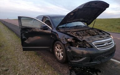 My car after hitting a deer in South Dakota