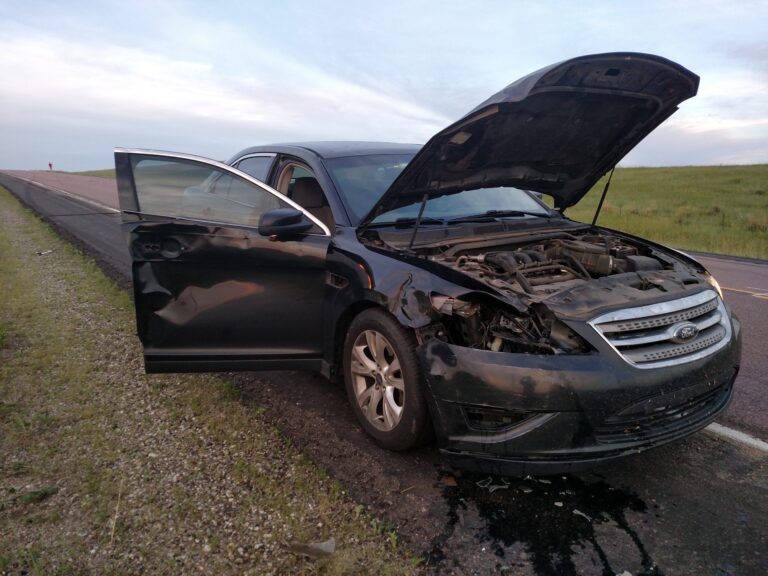 My car after hitting a deer in South Dakota